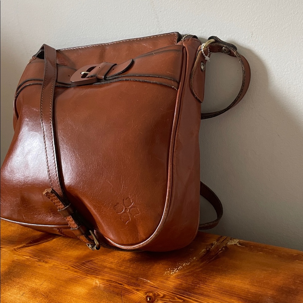 Patricia Nash Leather Saddle Crossbody Bag with Buckle Detail in Cognac - Picture 4 of 9
